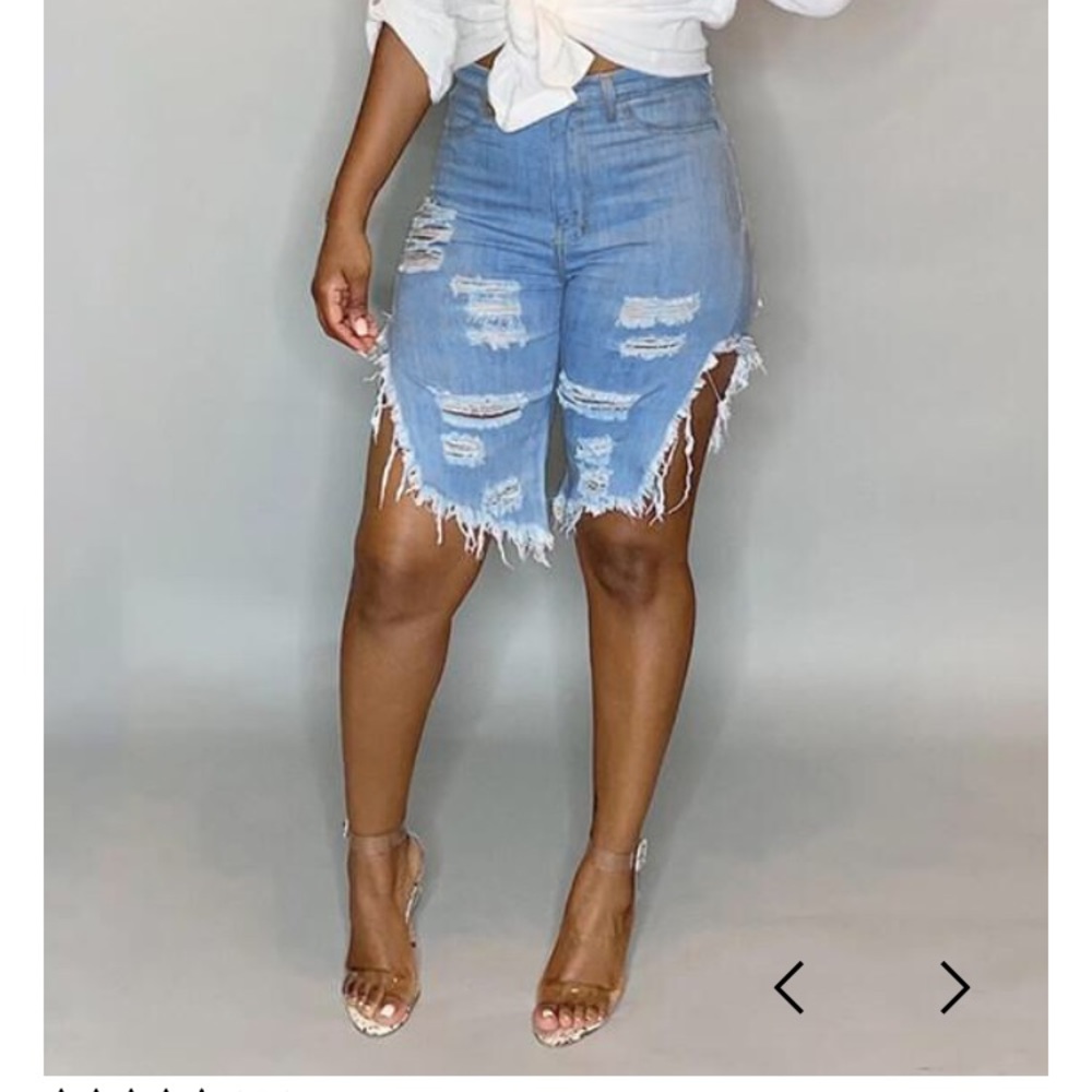 Distressed slit denim shorts